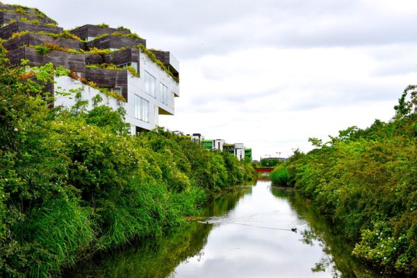 Bjarke Ingels designed this building, which opened in 2008, and it has since won the title of World's Best Residential Building at the World Architecture Fair. The apartments cascade down over the parking area and each has its own garden.